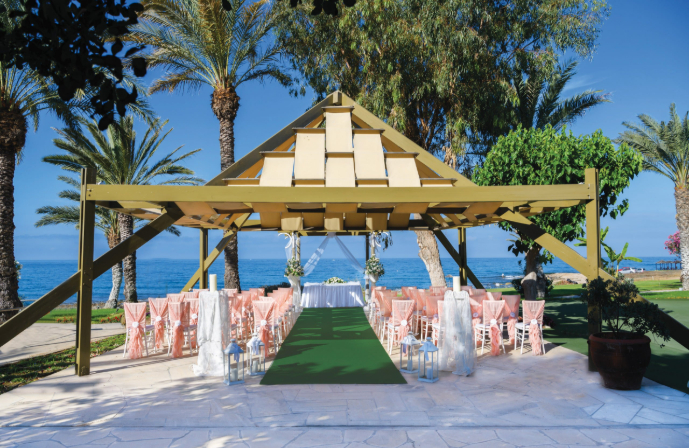 //www.jet2holidays.com/-/media/custom overview images/j2w/90-athena-beach-hotel-wedding-gazebo-scaled.jpg